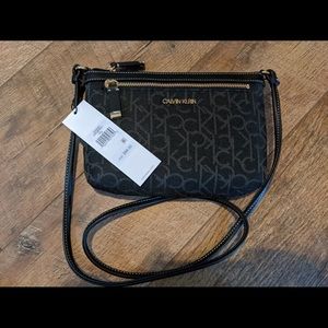 Calvin Klein “swing” crossbody bag